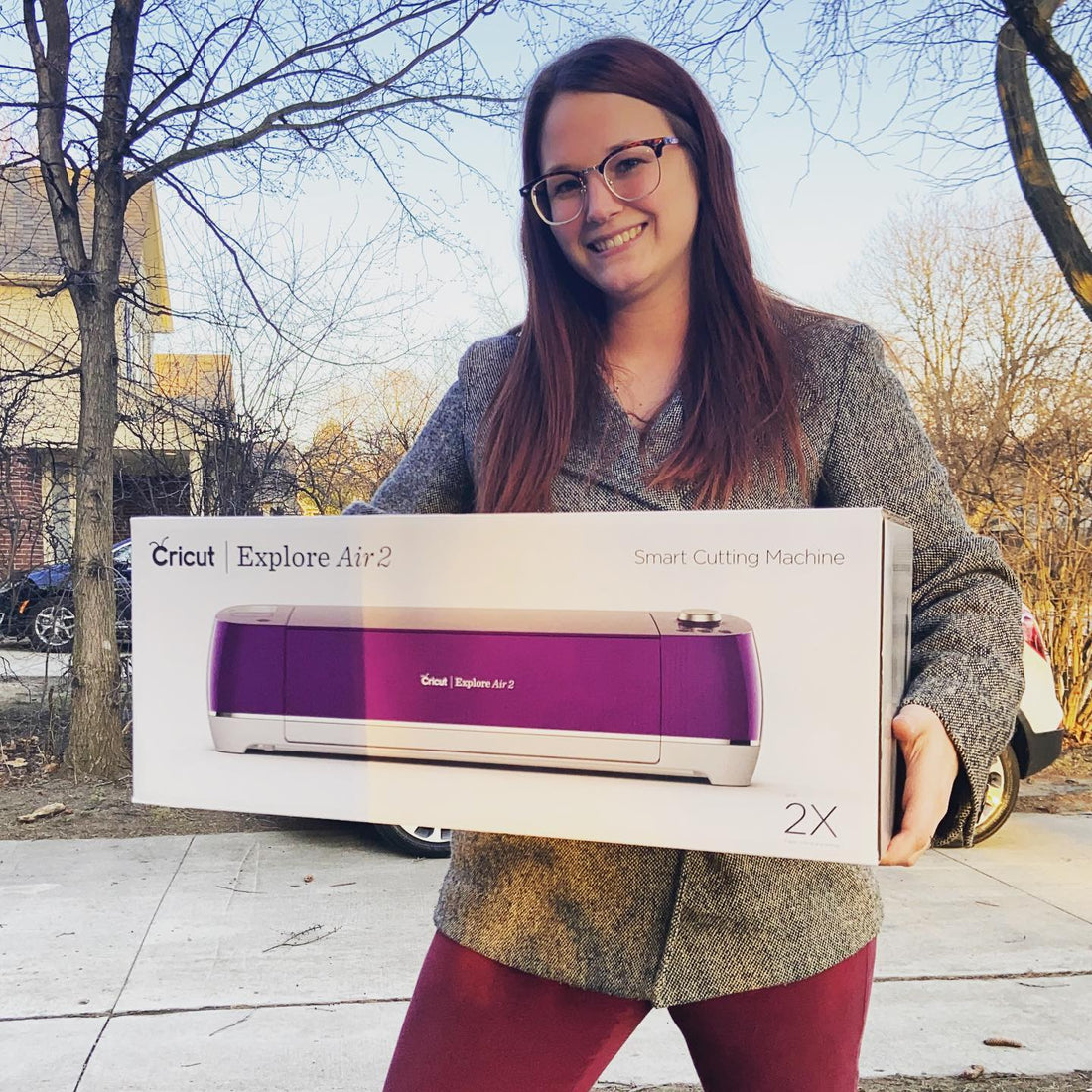 Kerriann holding a cricut