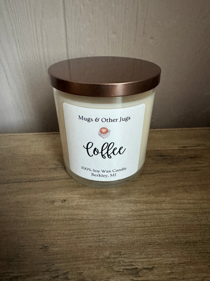 Candle with a label on a wooden surface