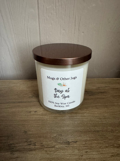 Candle with a label on a wooden surface