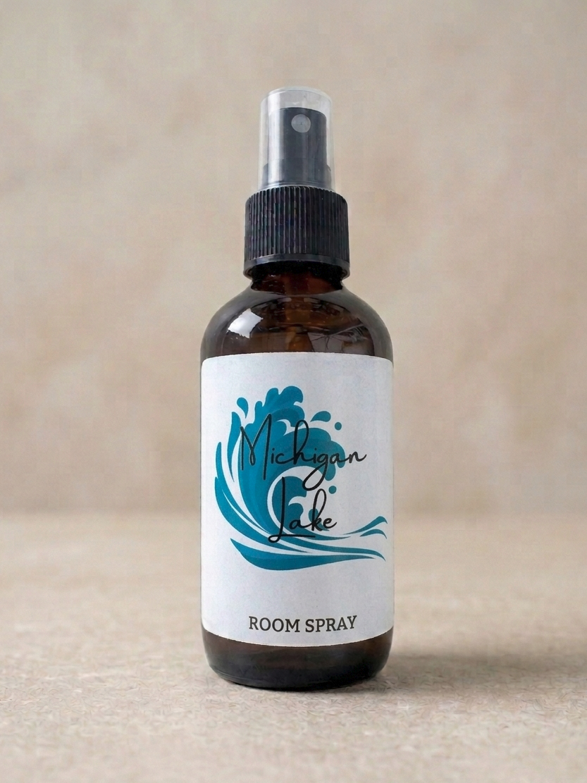 Room spray bottle with a label featuring a wave design on a beige background